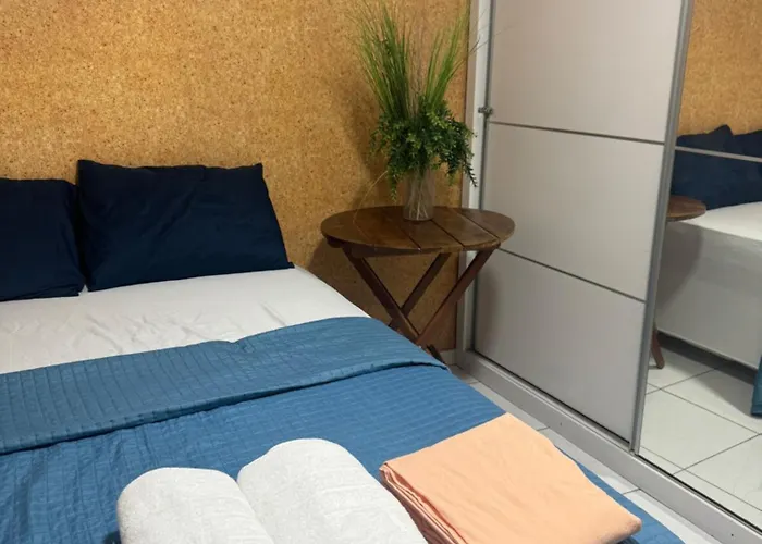 Quarto em AP compartilhado Ponta da areia