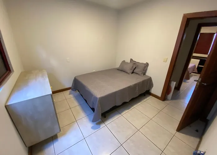 Cobertura quadra mar